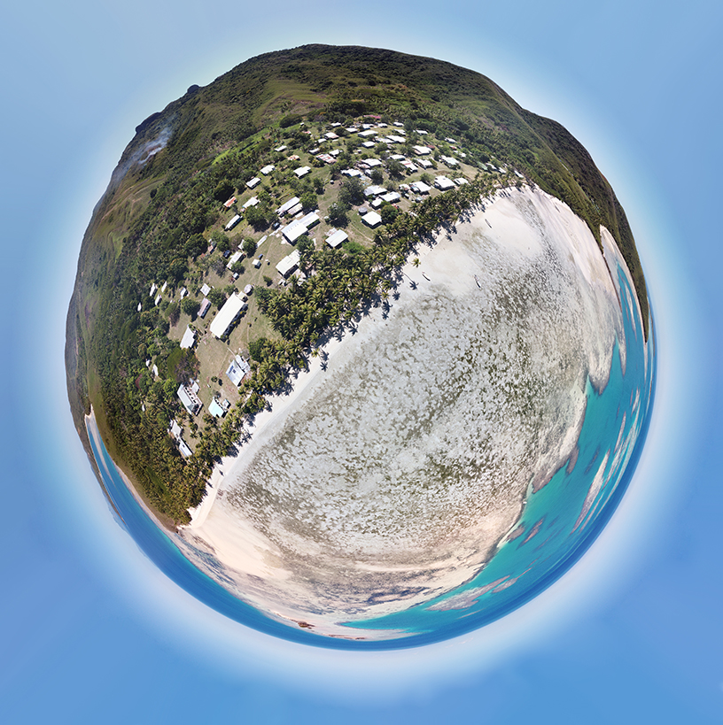 A fisheye panorama at the shoreline shows the entire 360 degree view like a tiny Earth blue marble.