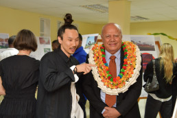 LAGI 2025 Fiji Stage 1 competition winner, Young Kang, explains the concepts behind his design, Ligavatuvuce. to the Hon. Viliame Gavoka, Deputy Prime Minister of Fiji.