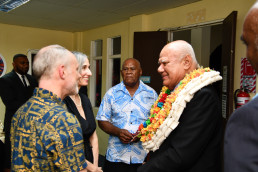 Elizabeth Monoian and Robert Ferry, LAGI Co-founders, talk with Ilisari Naqau, Acting Chief of Marou Village, and the Hon. Viliame Gavoka, Deputy Prime Minister of Fiji and Minister of Tourism and Civil Aviation.