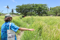Alberto Roncelli walking the project site in Marou Village.