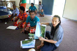 Young Kang gets feedback on his design, Ligavatuvuce, during a workshop in Marou Village.