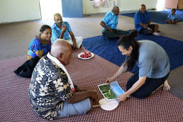 Young Kang gets feedback on his design, Ligavatuvuce, during a workshop in Marou Village.
