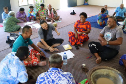 Young Kang gets feedback on his design, Ligavatuvuce, during a workshop in Marou Village.