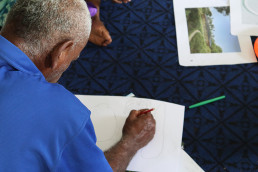 Marou residents sketch during a workshop in Marou Village.