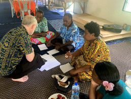 Robert Ferry engages with residents of Marou Village during one of the week's design workshops.