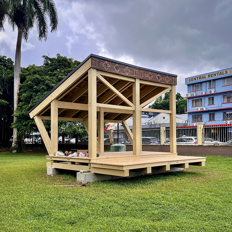 Photo of the built and functioning prototype with decorative beam. Daytime with partly cloudy skies.