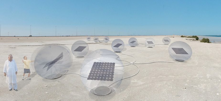LAGI2010-ab1230_1pdf Clear spheres with solar modules inside sitting on an open beach.