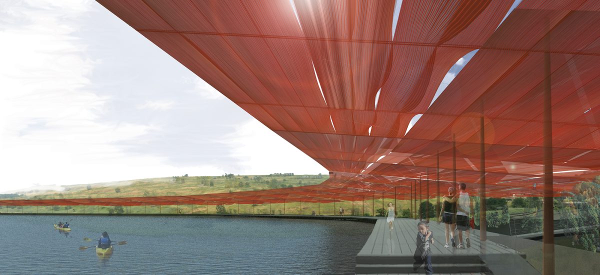 Tapestry of orange sheets filter the sunlight above a river's edge.