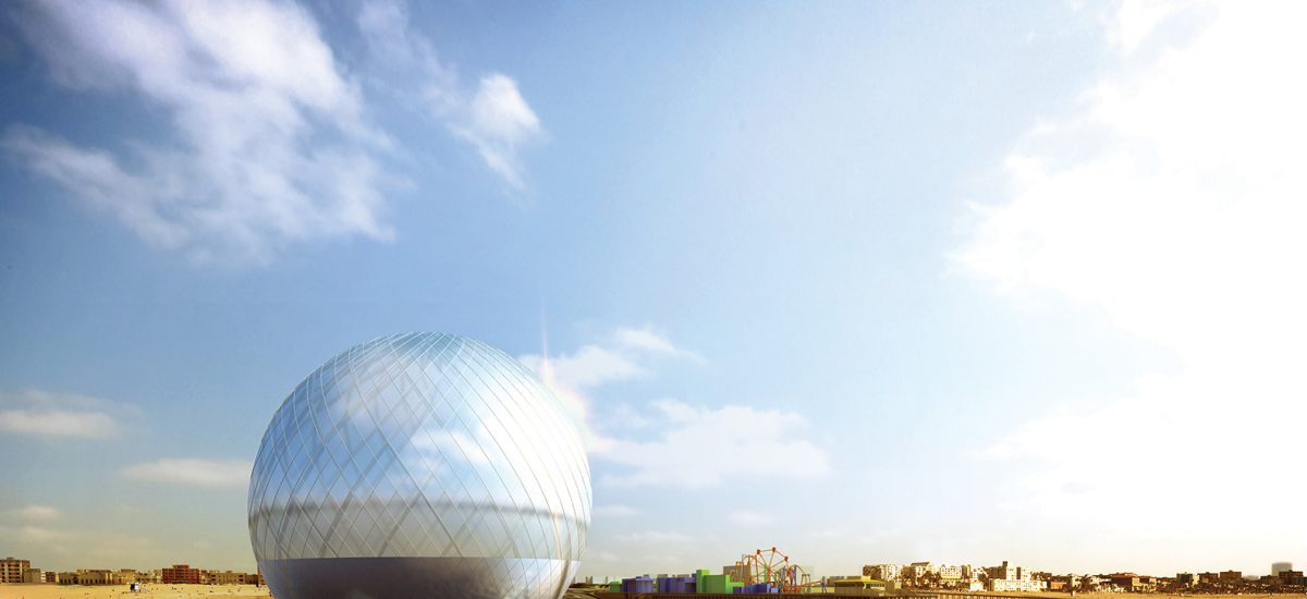 he Clear Orb, a submission to LAGI 2016 Santa Monica Walking on the Santa Monica beach, The Clear Orb appears to float upon the surface of the ocean water. The colors of the sky are refracted through the translucent glass upper section, while the lower hemisphere’s reflective, mirror-like surface glitters with the sunlight playing on the ocean waves.