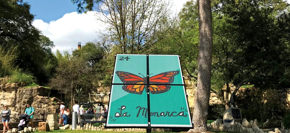 La-Monarca-HR La Monarca visits the San Antonio Zoo! This Land Art Generator Initiative Solar Mural project was a partnership with Mission Solar Energy, OCI Solar Power, EPIcenter New Energy Innovation Center, Land Heritage Institute, Sun Action Trackers, LLC, and Local Initiatives Support Corporation. he La Monarca image was designed by San Antonio artist Cruz Ortiz with creative direction by Penelope Boyer. Photo by Penelope Boyer.