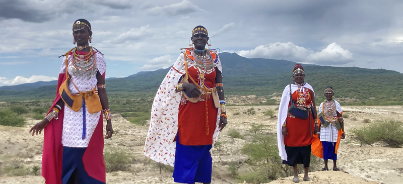 tote-01 Partners in Olorgesailie, Kenya model functioning prototypes of solar integrated into Maasai designed bags and accessories. Bags easily keep cell phones charged throughout the day. Bracelets and smaller accessories charge lights.